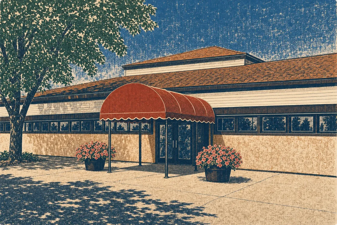 The Detroit Lakes Pavilion entrance before demolition: a red barrel awning, stucco walls under a brown hip roof and two planters of pink petunias